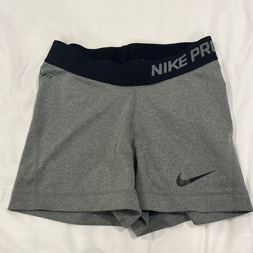 Grey Nike pros with black band